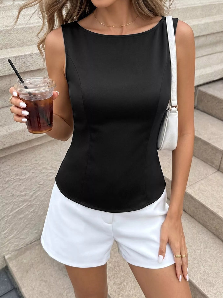 Sleeveless fitted top with cutout back and bow
