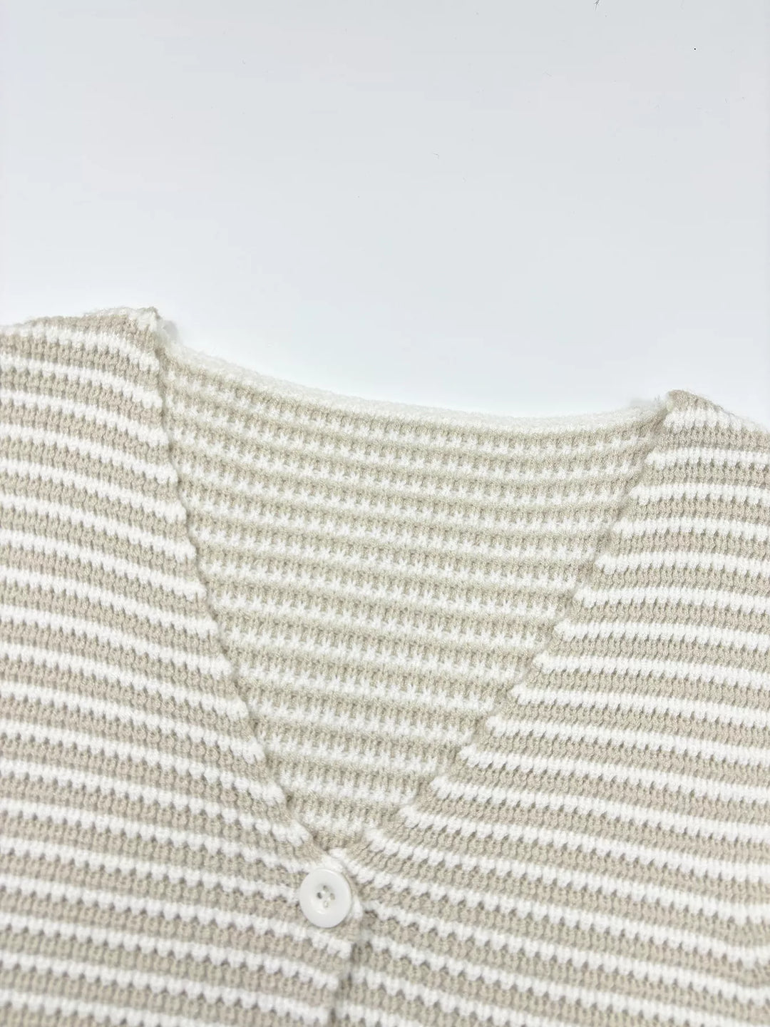 Striped button-front cropped knit vest with deep V-neck