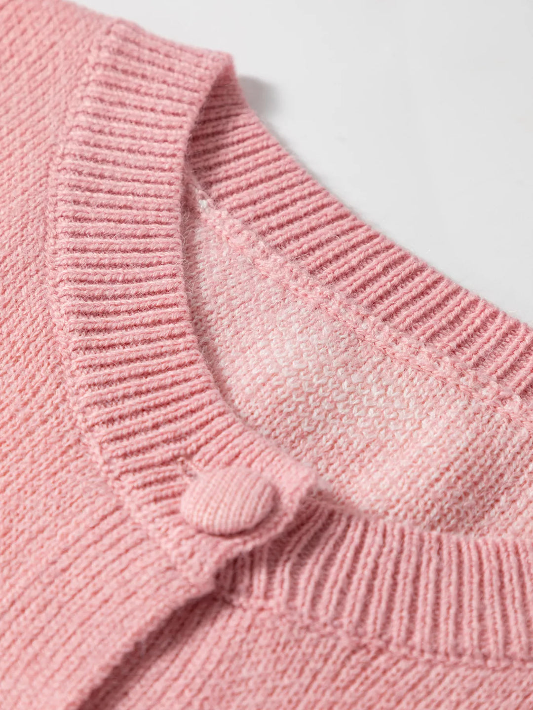 Heart pattern button-front knit cardigan with ribbed trim