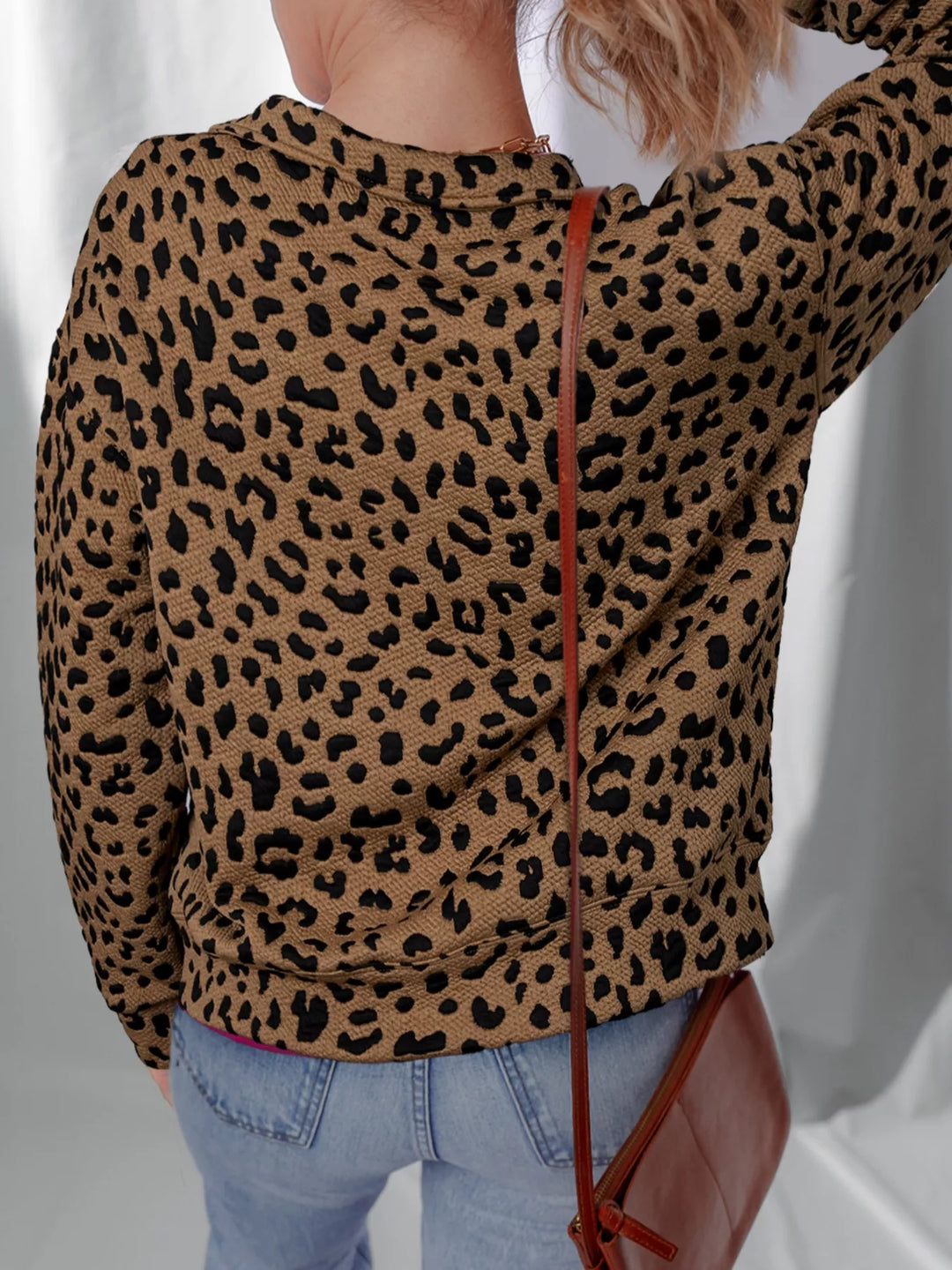 Textured leopard quarter-zip sweatshirt with pocket
