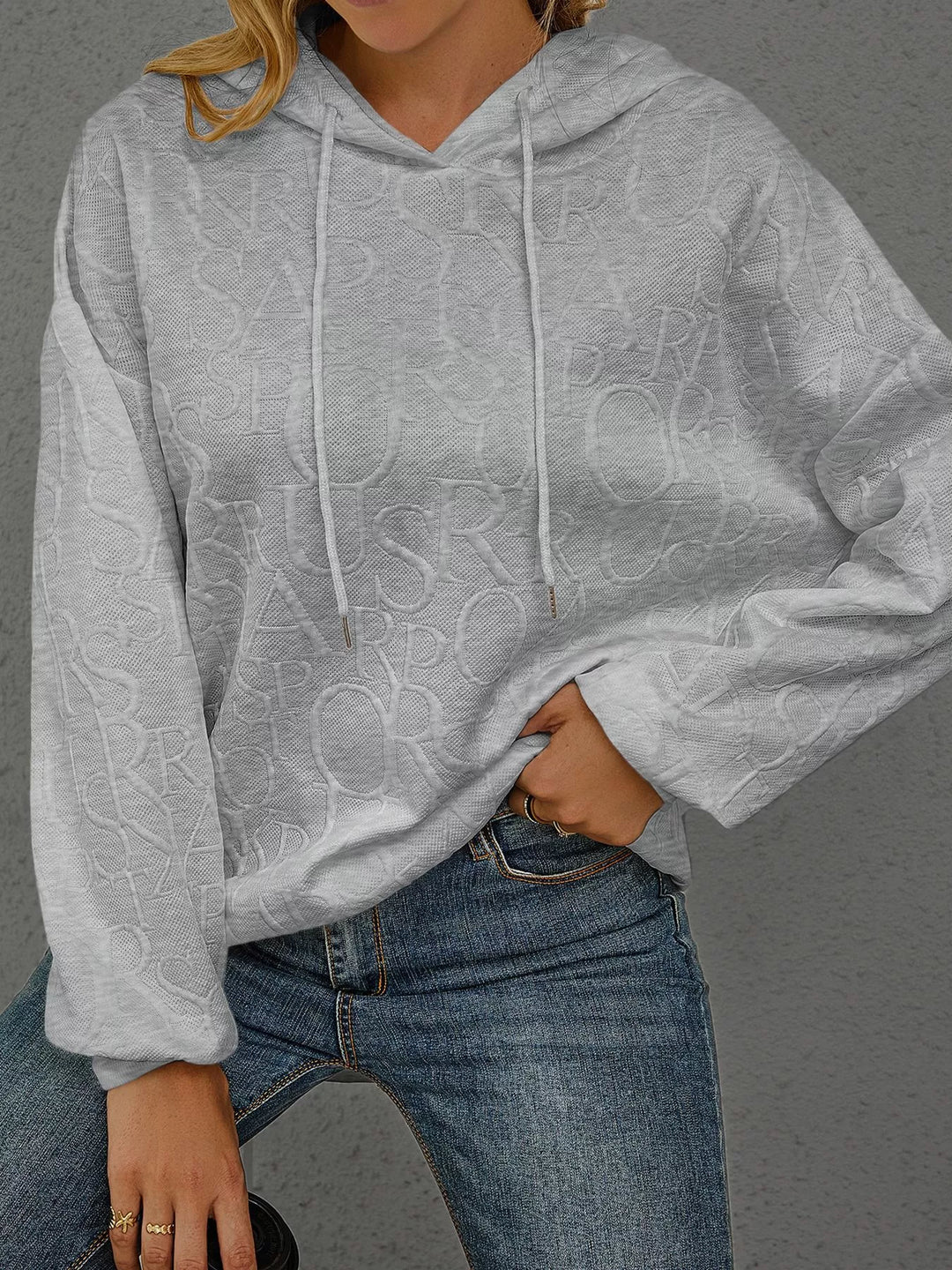 Embossed lettering drawstring pullover hoodie
