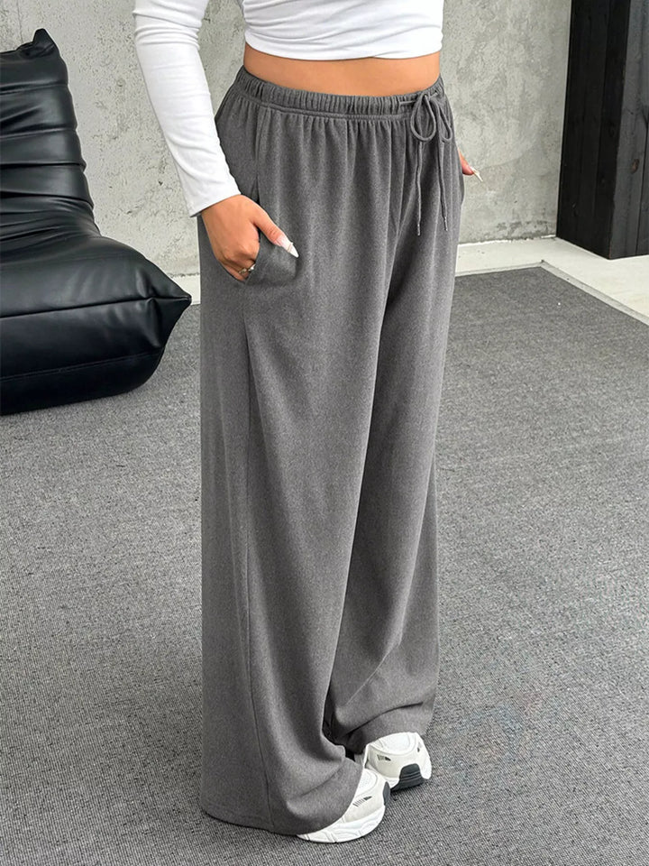 Wide-leg drawstring pants with elastic waist and pockets