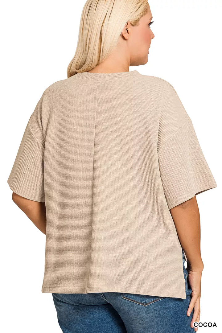 Textured double knit crew neck top with side slits and hi-low hem