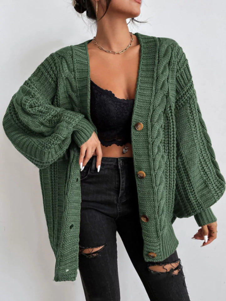 Oversized cable knit button-down cardigan with V-neck