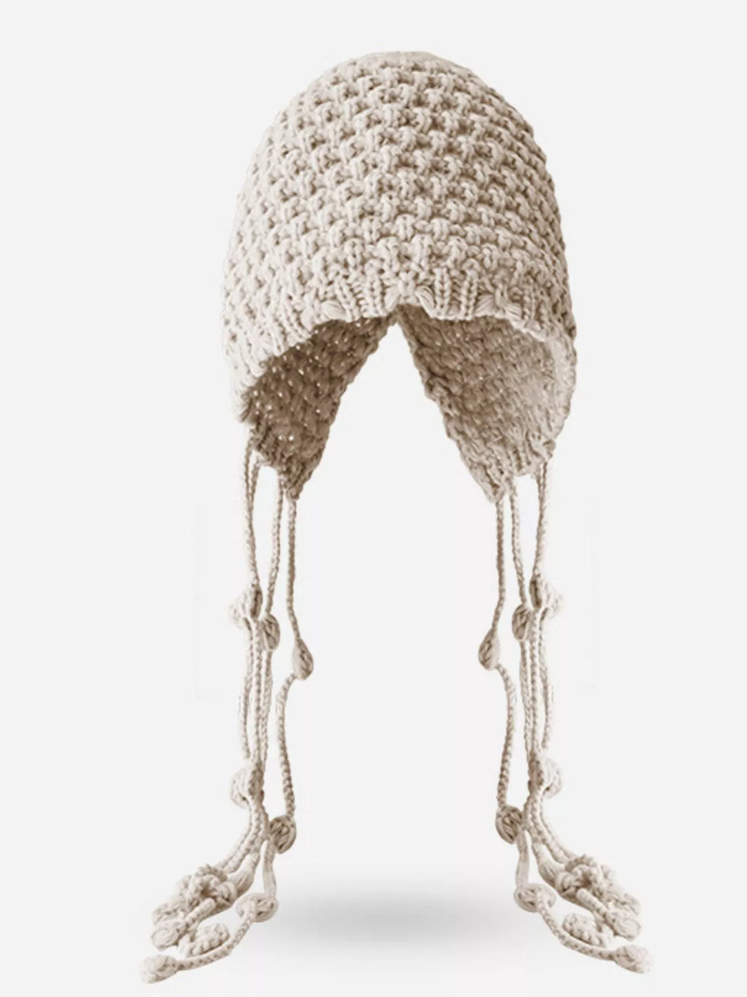 Cream Chunky knit earflap beanie with braided tassel ties