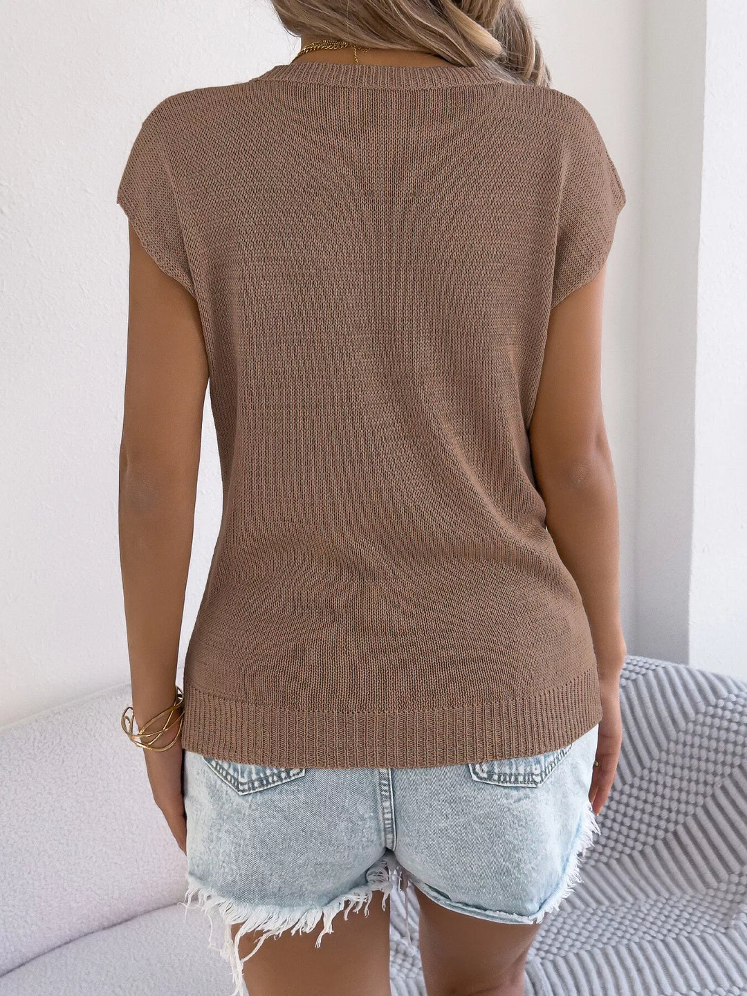 Cable knit openwork cap sleeve sweater