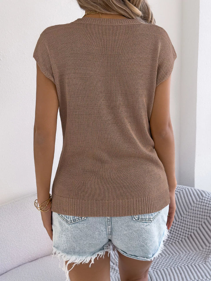 Cable knit openwork cap sleeve sweater