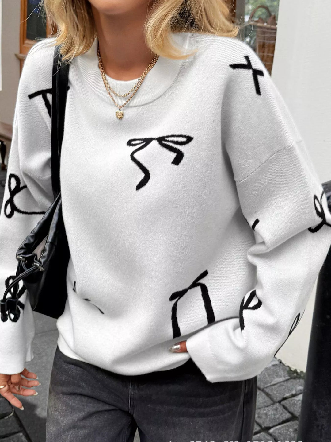 Bow print dropped-shoulder round neck sweater