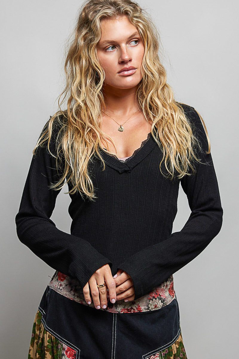 Ribbed knit v-neck long sleeve top with lace trim