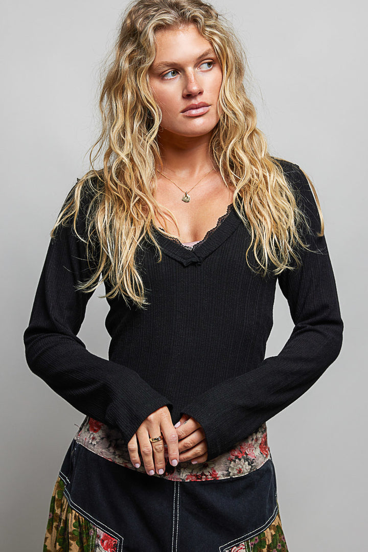 Ribbed knit v-neck long sleeve top with lace trim
