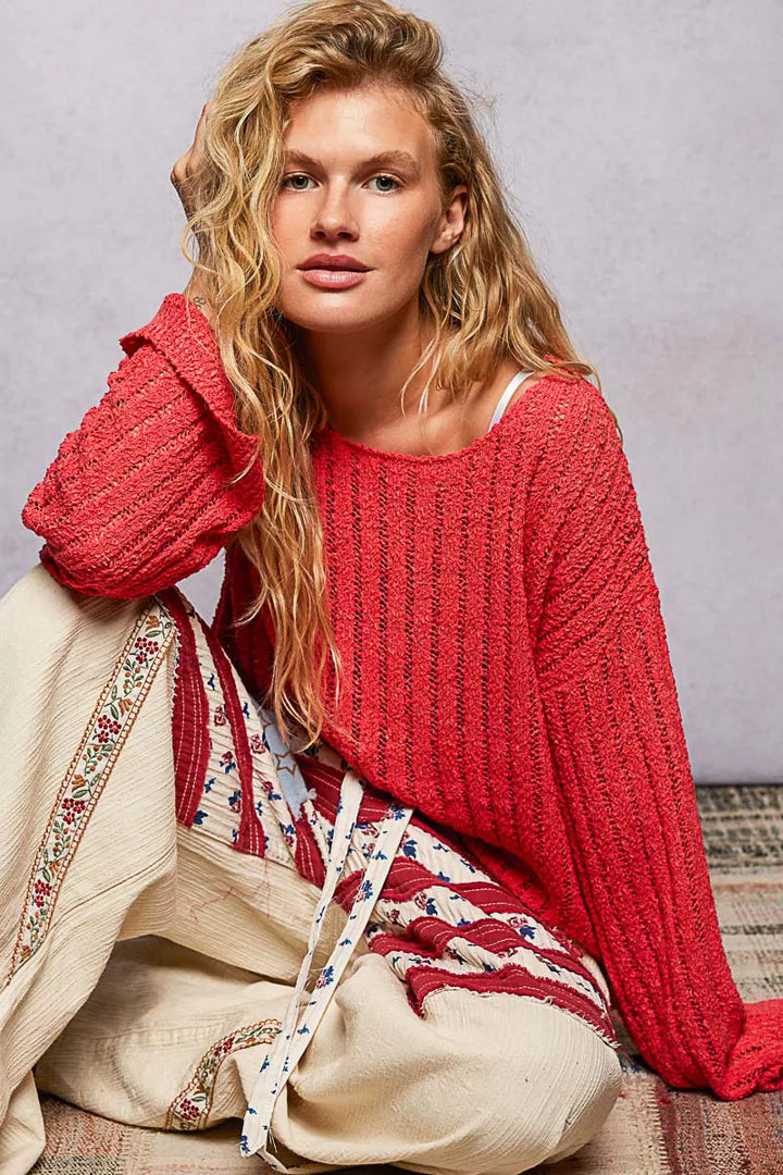 Open-weave knit sweater with relaxed drop-shoulder fit