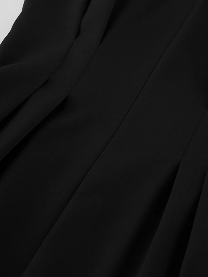 Collarless button-front jacket with cinched pleated waist