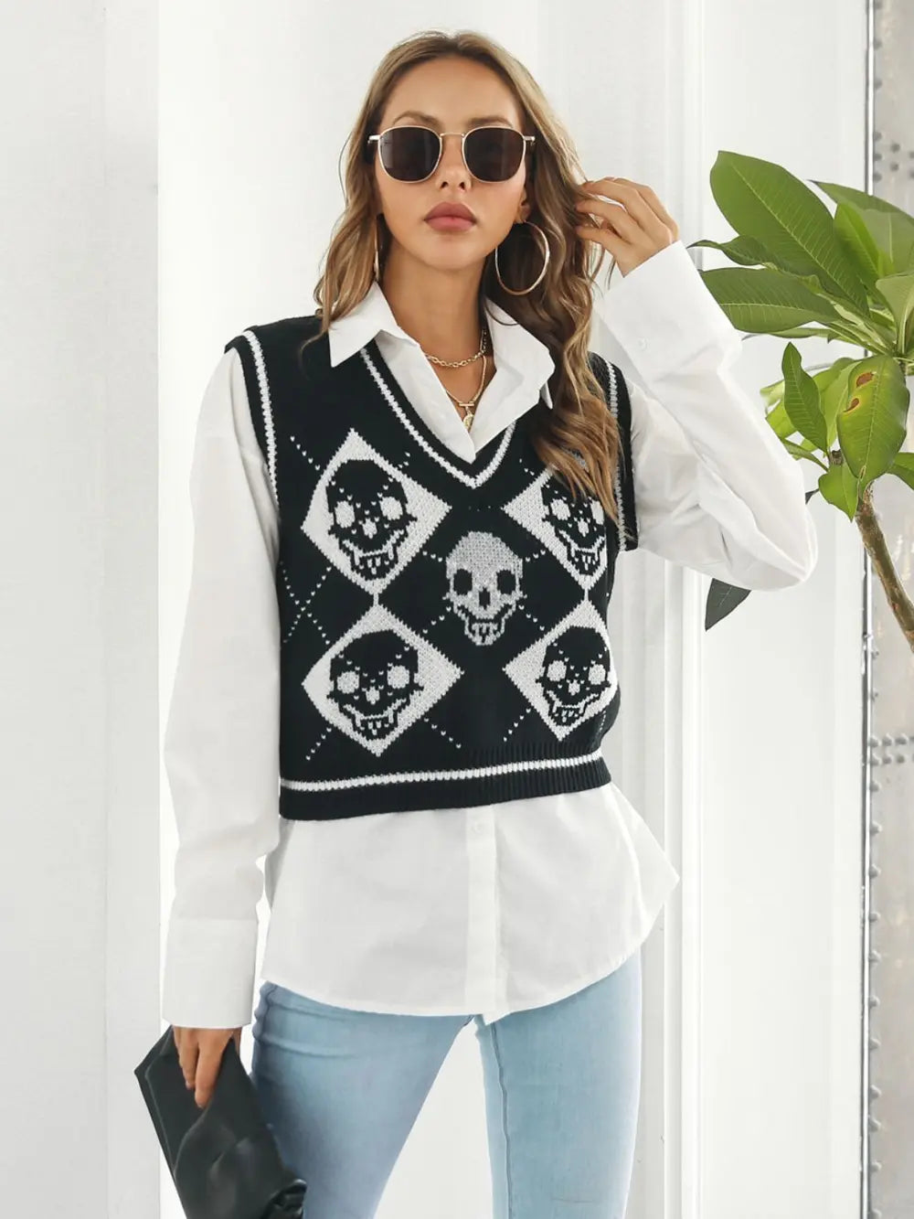 Skull argyle knit sweater vest with striped V-neck