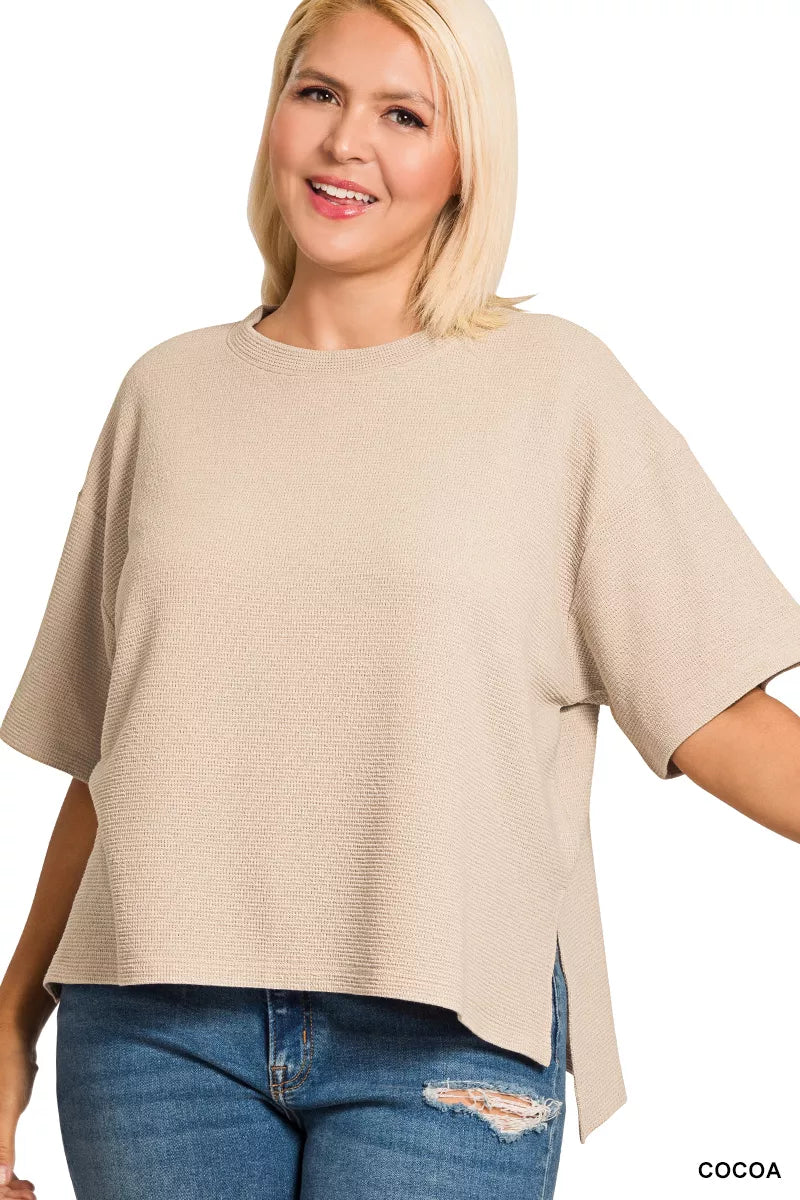 Textured double knit crew neck top with side slits and hi-low hem