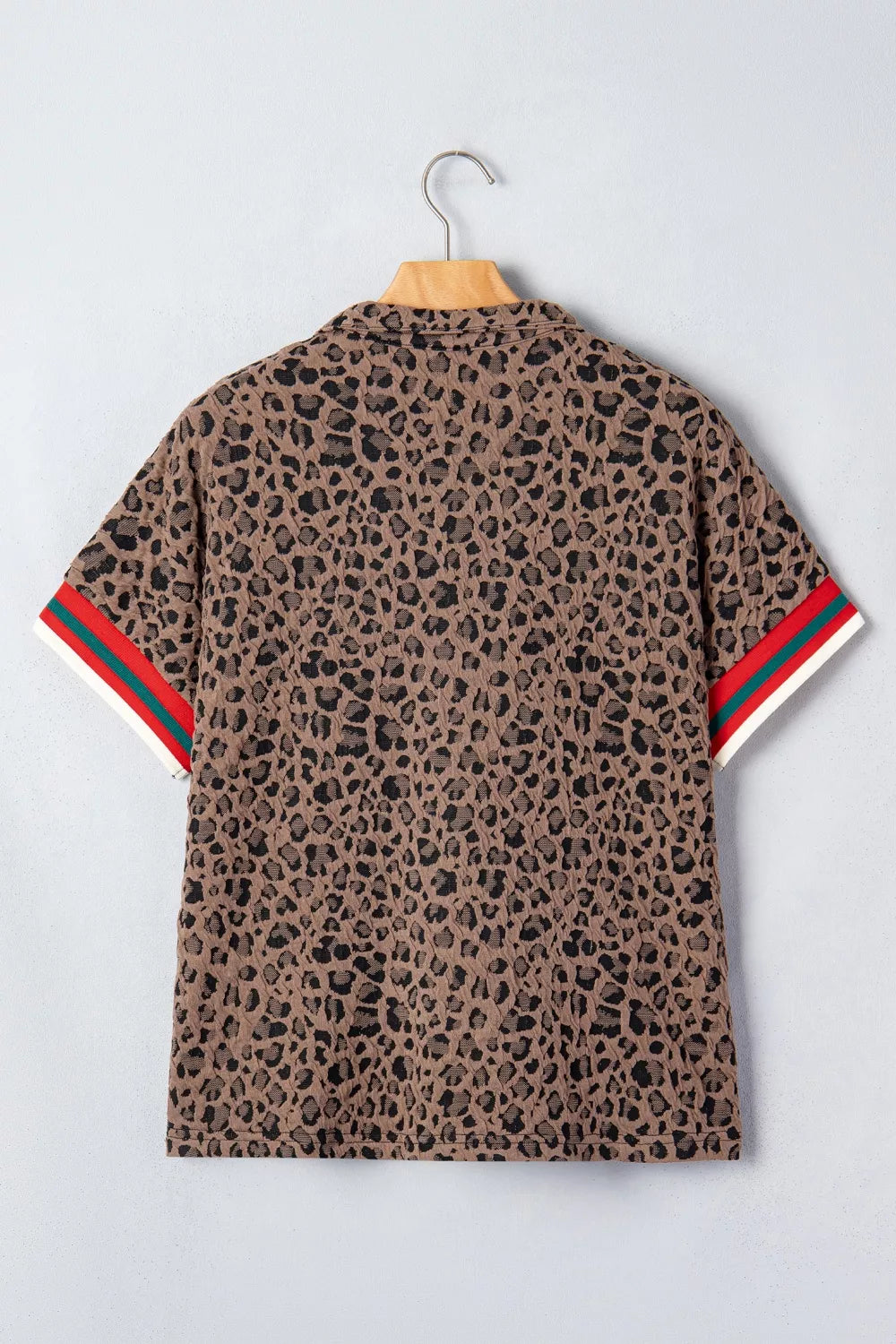 Leopard half-zip short sleeve top with striped collar and cuffs