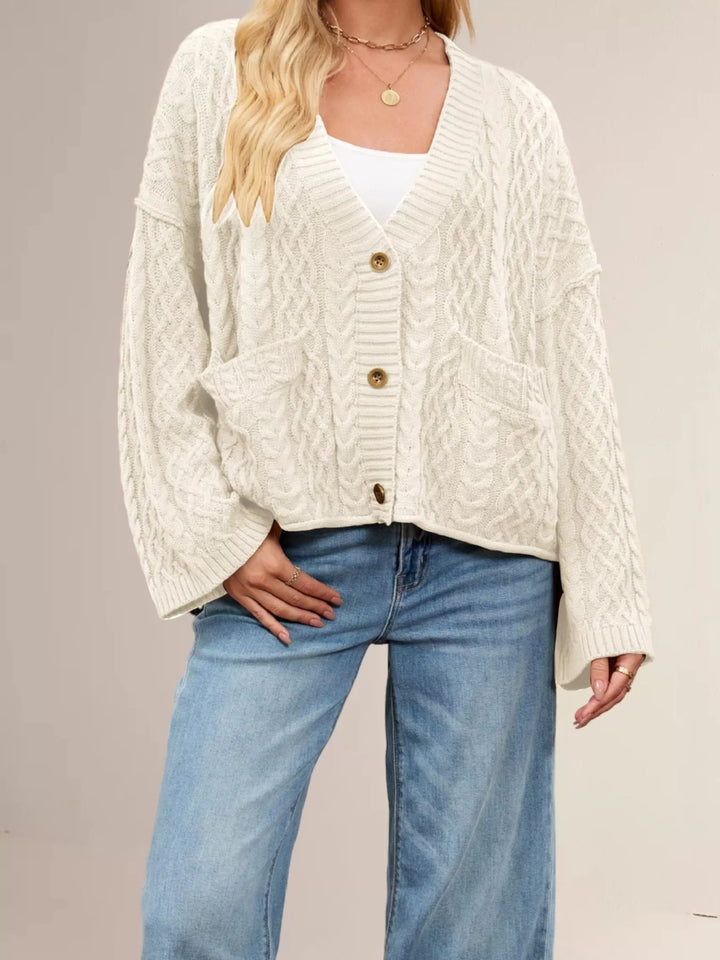 Cable knit button-front cardigan with patch pockets