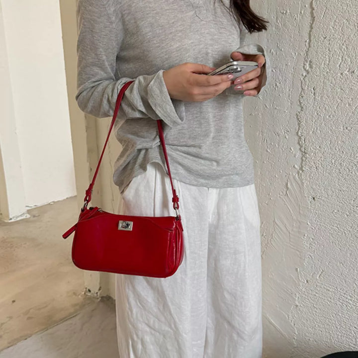 Red Faux leather baguette shoulder bag with twist lock