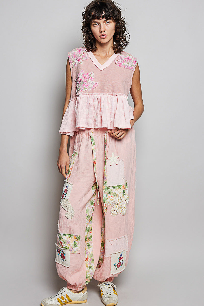 Floral patch V-neck sleeveless top with ruffle hem and raw-edge detail