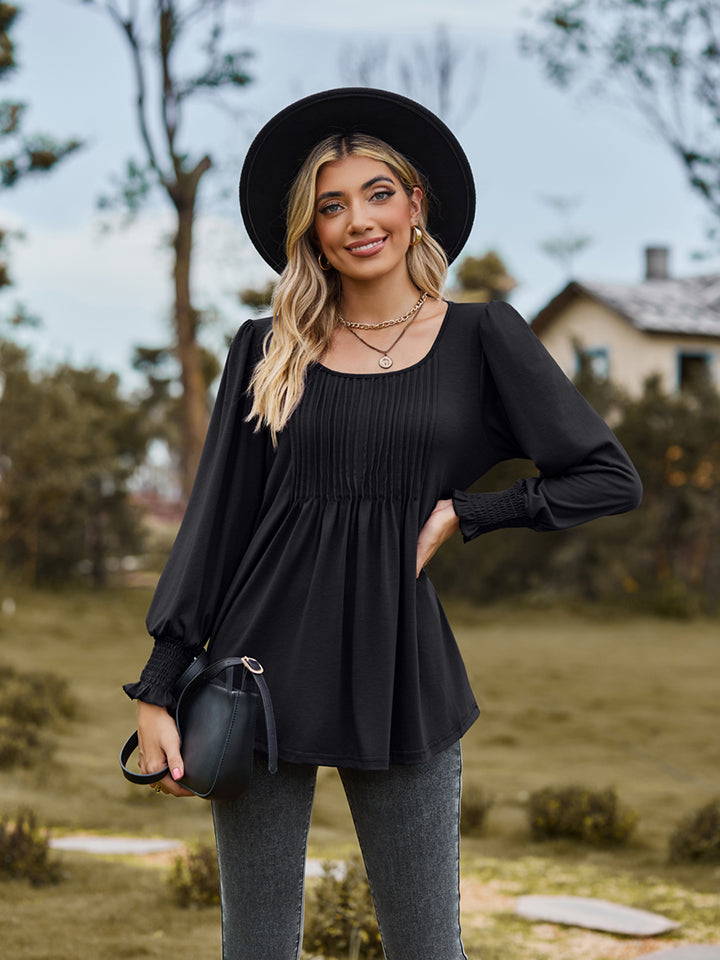 Pintuck pleated puff sleeve blouse with smocked cuffs