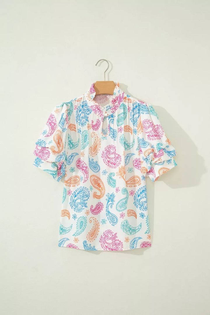 Paisley print keyhole blouse with ruffle neck and puff sleeves