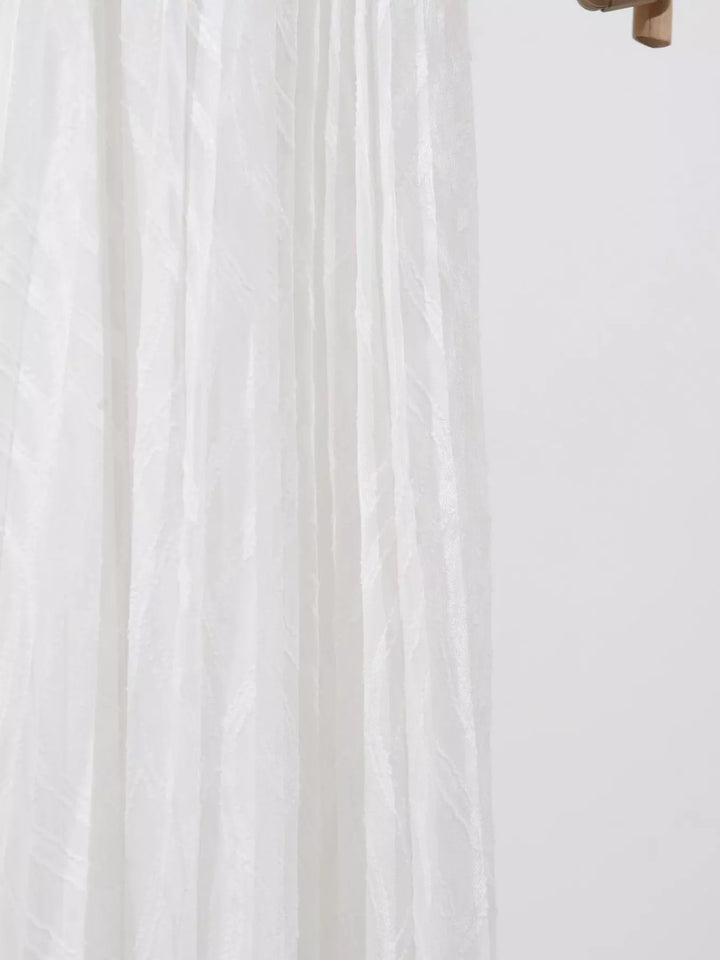 Textured V-neck balloon sleeve maxi dress with twist front