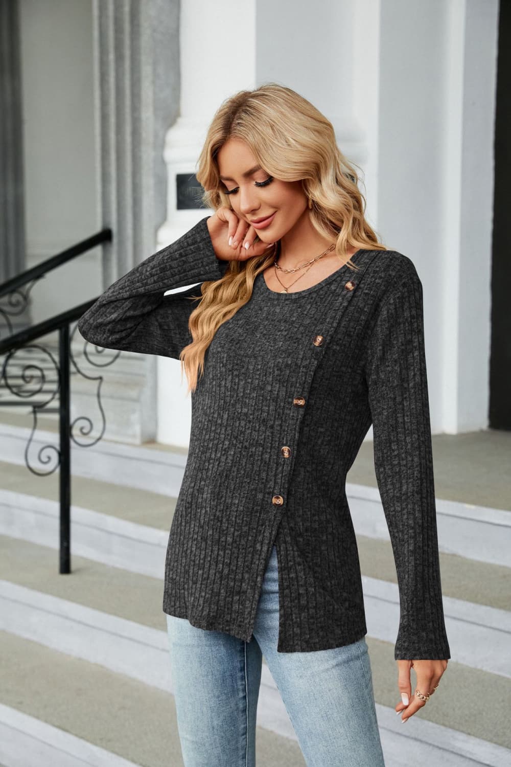 Ribbed knit long sleeve top with side buttons and slit hem