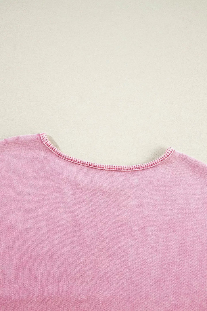 Vintage wash oversized sweatshirt with exposed seams and side slits