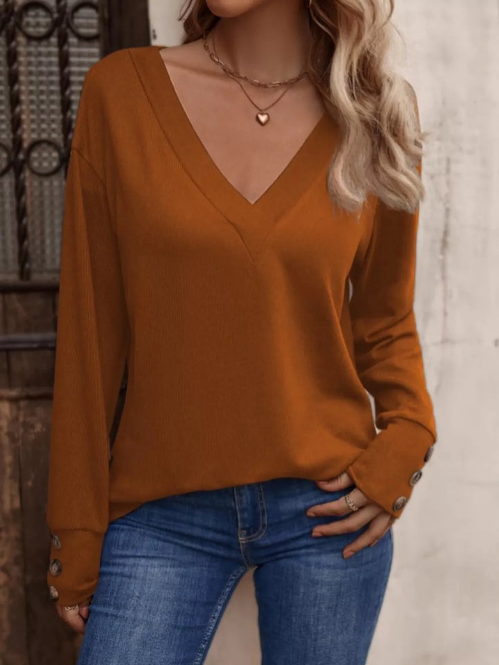 V-neck long sleeve top with button cuffs