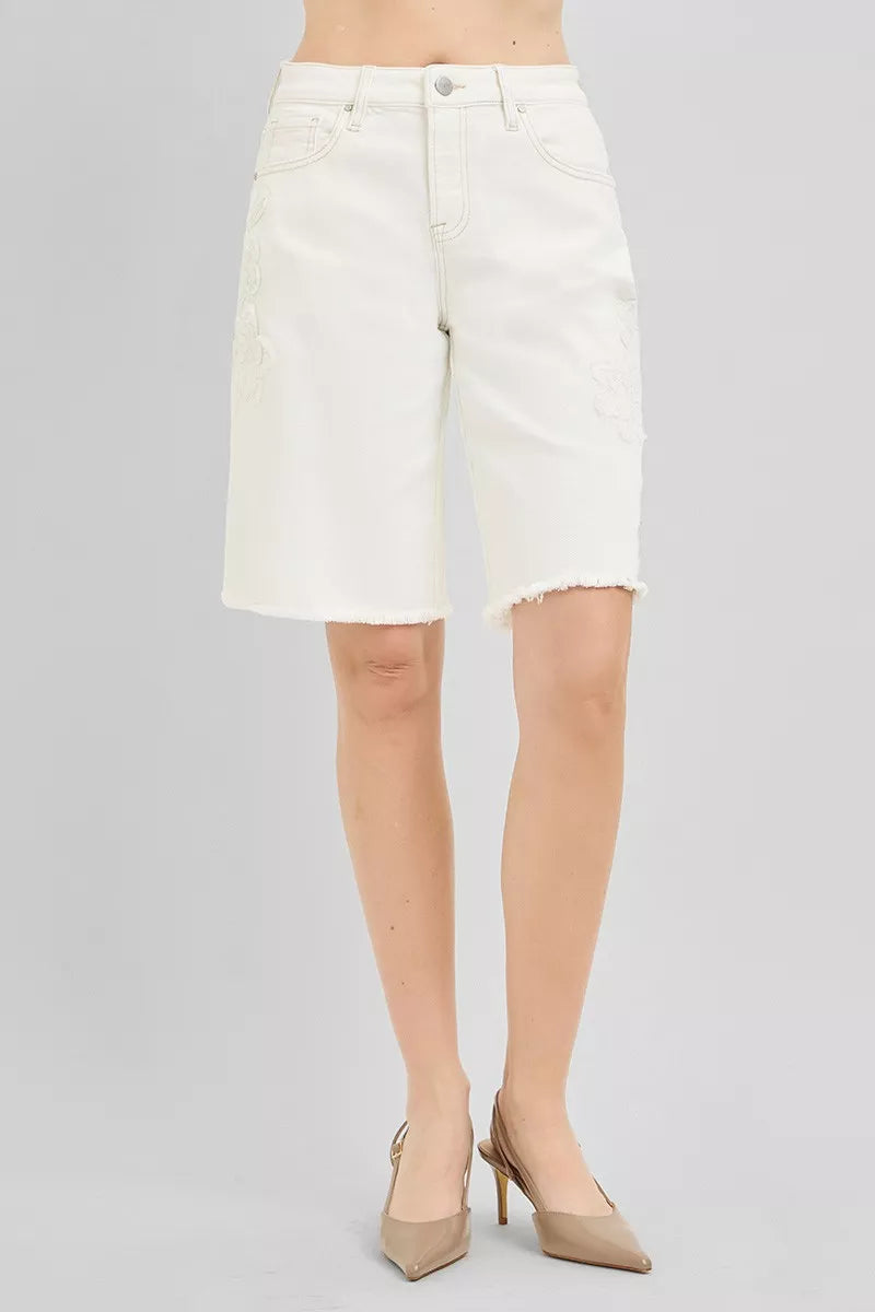 Relaxed Bermuda denim shorts with floral embroidery and raw hem