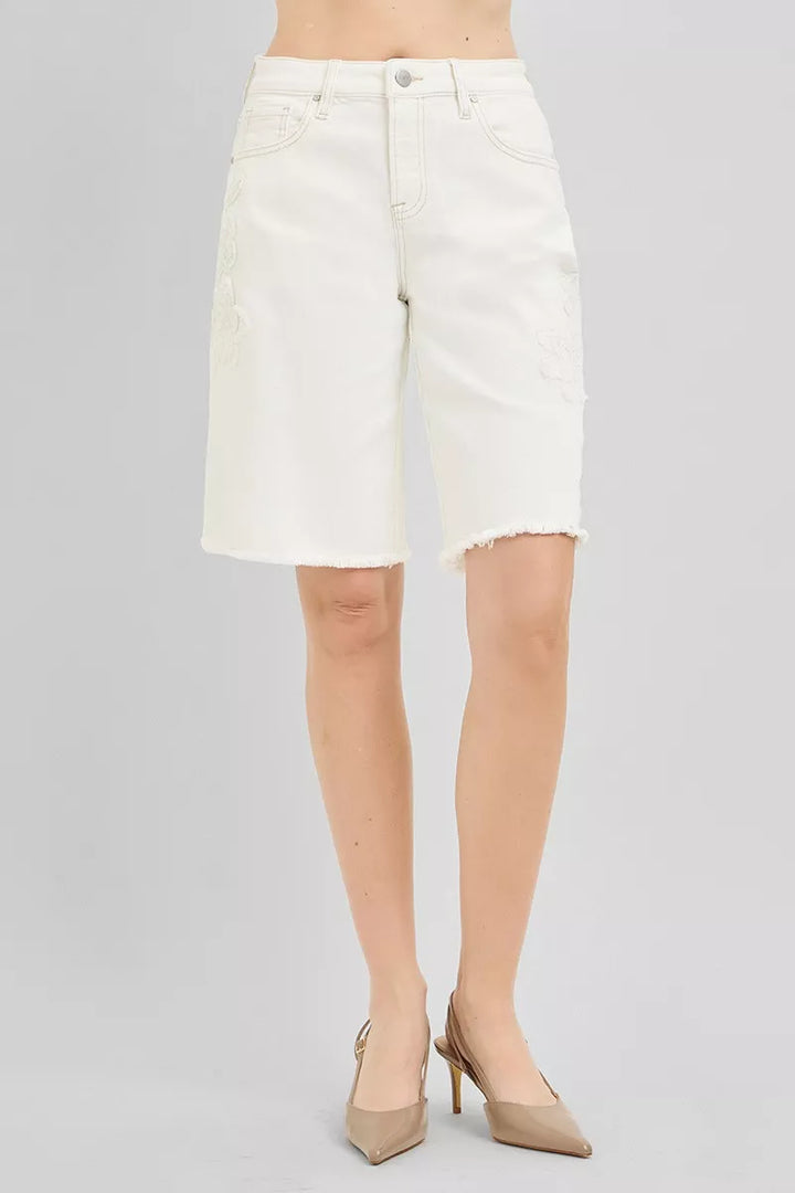 Relaxed Bermuda denim shorts with floral embroidery and raw hem