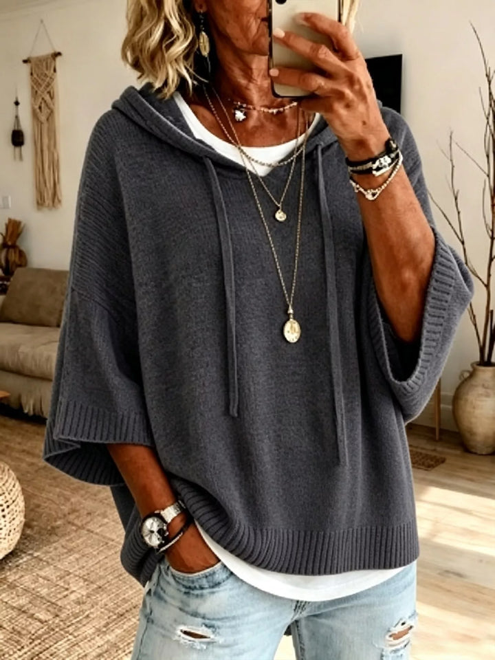 Hooded batwing sleeve knit sweater with drawstring