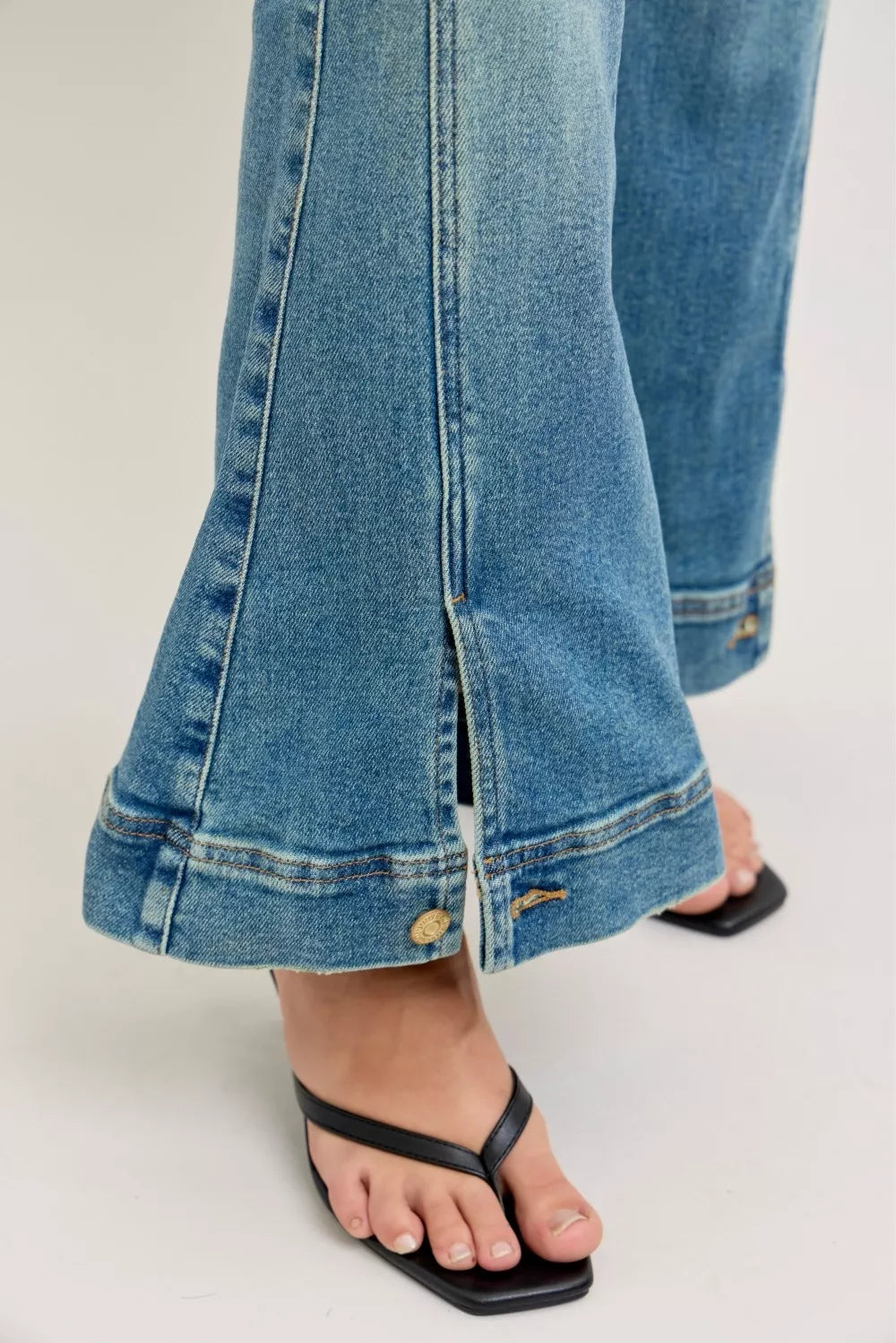 High-rise vintage wash flare jeans with released hem