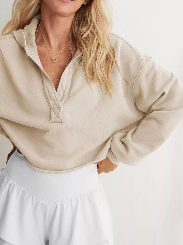 Cropped exposed-seam pullover hoodie with split neck
