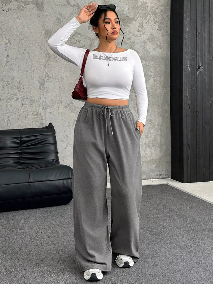 Wide-leg drawstring pants with elastic waist and pockets