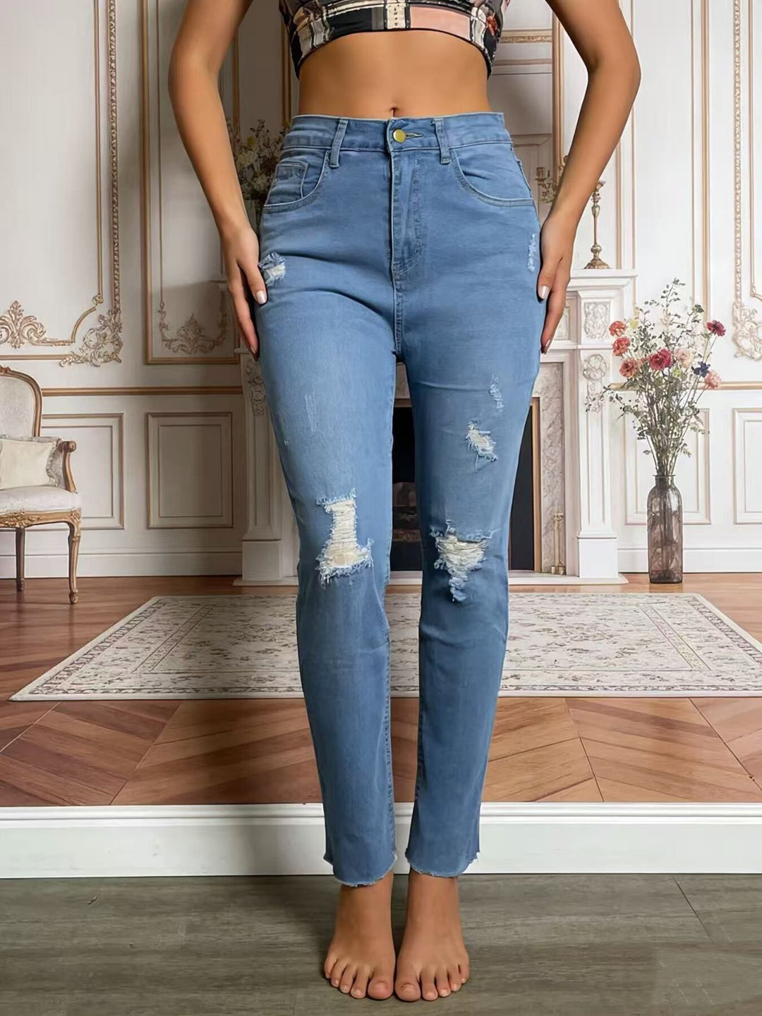 Distressed high-rise skinny jeans with frayed hem