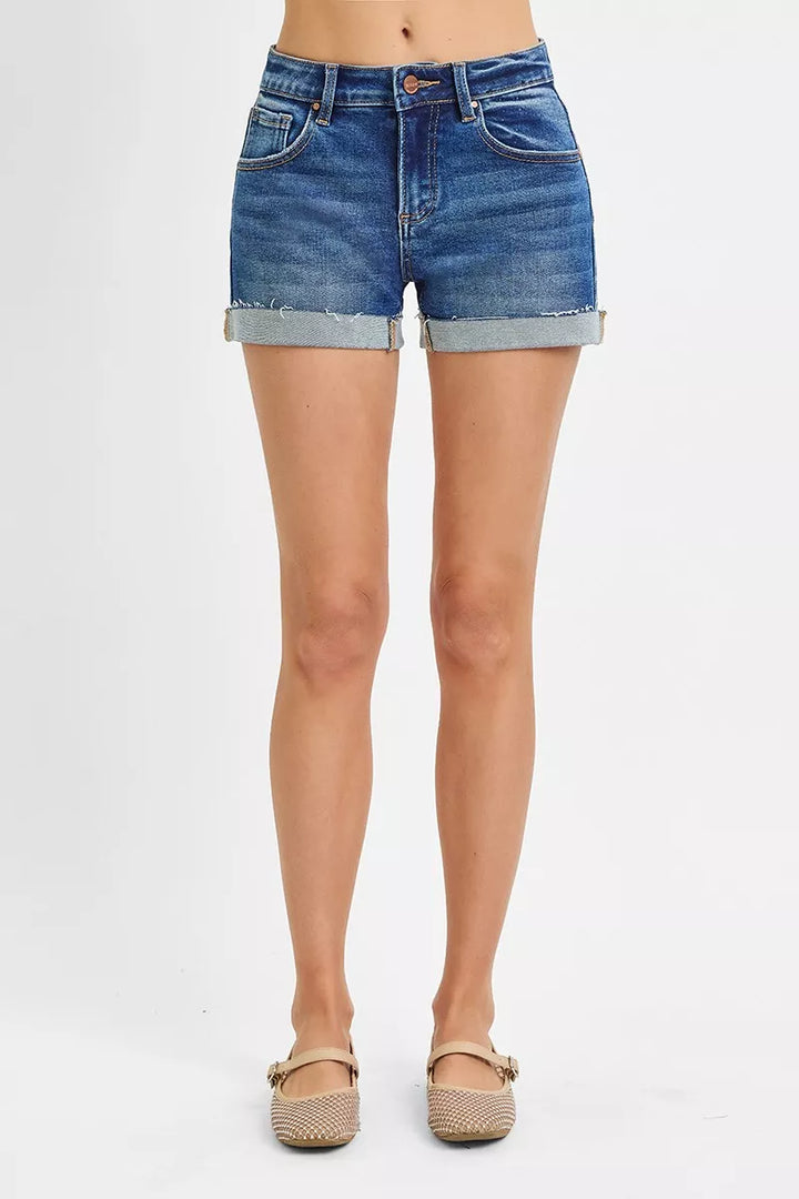 Cuffed low-rise denim shorts with raw hem detail