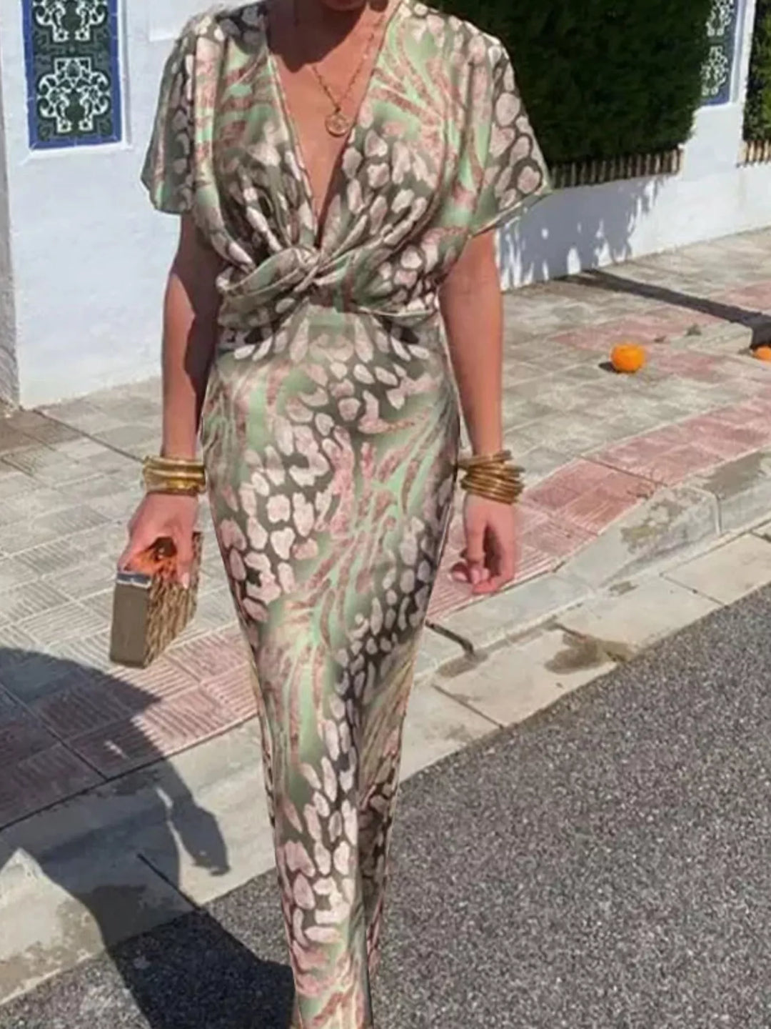 Sage Twist-front animal print V-neck maxi dress