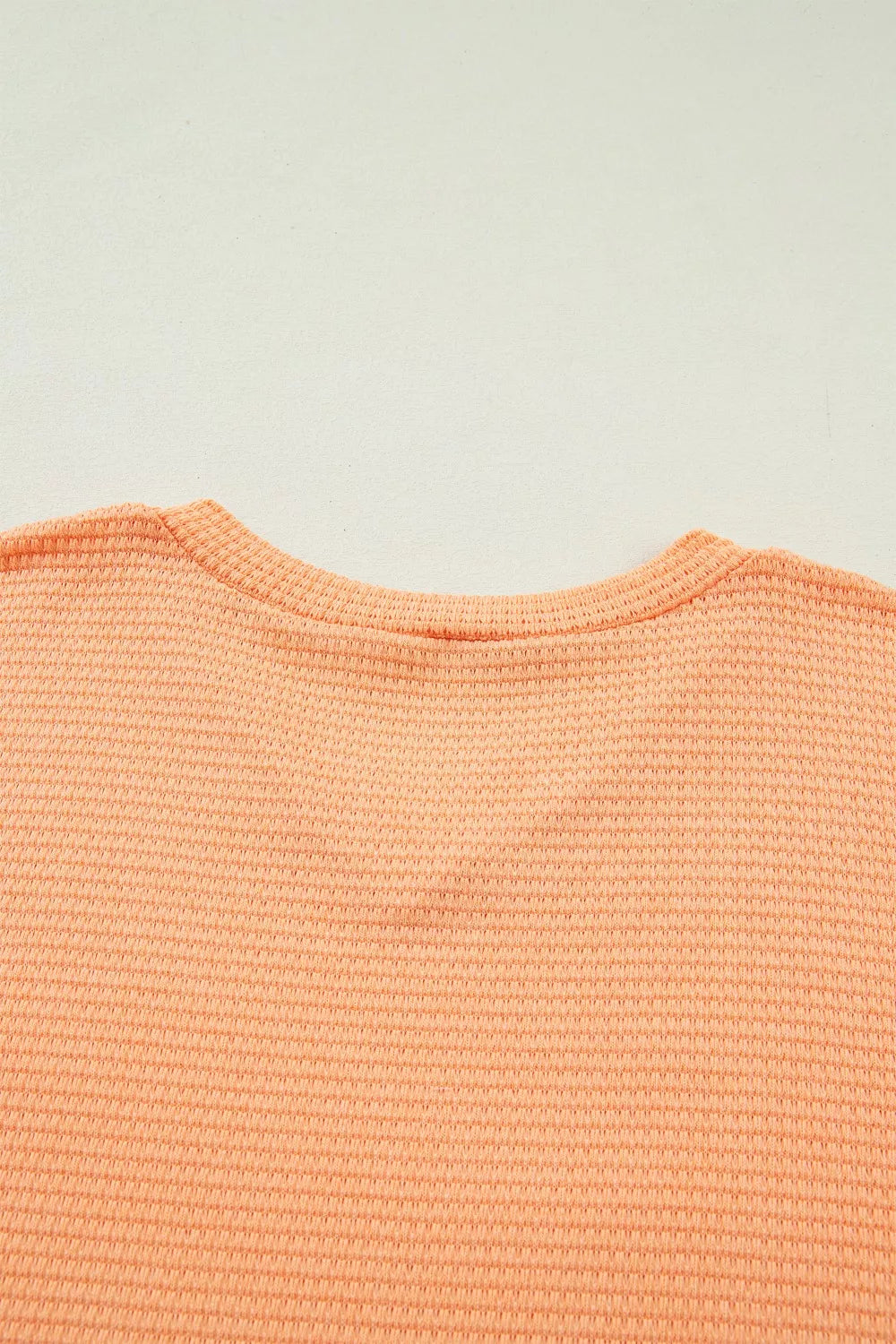 Waffle knit V-neck tee with cuffed short sleeves