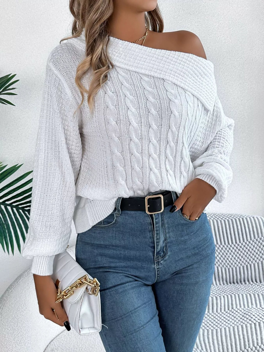 Cable knit one-shoulder sweater with fold-over ribbed collar