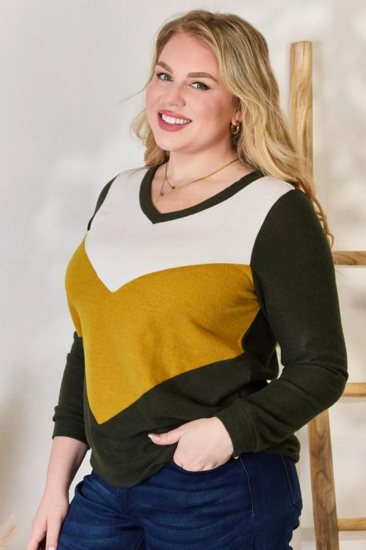 Color block chevron knit V-neck top with long sleeves