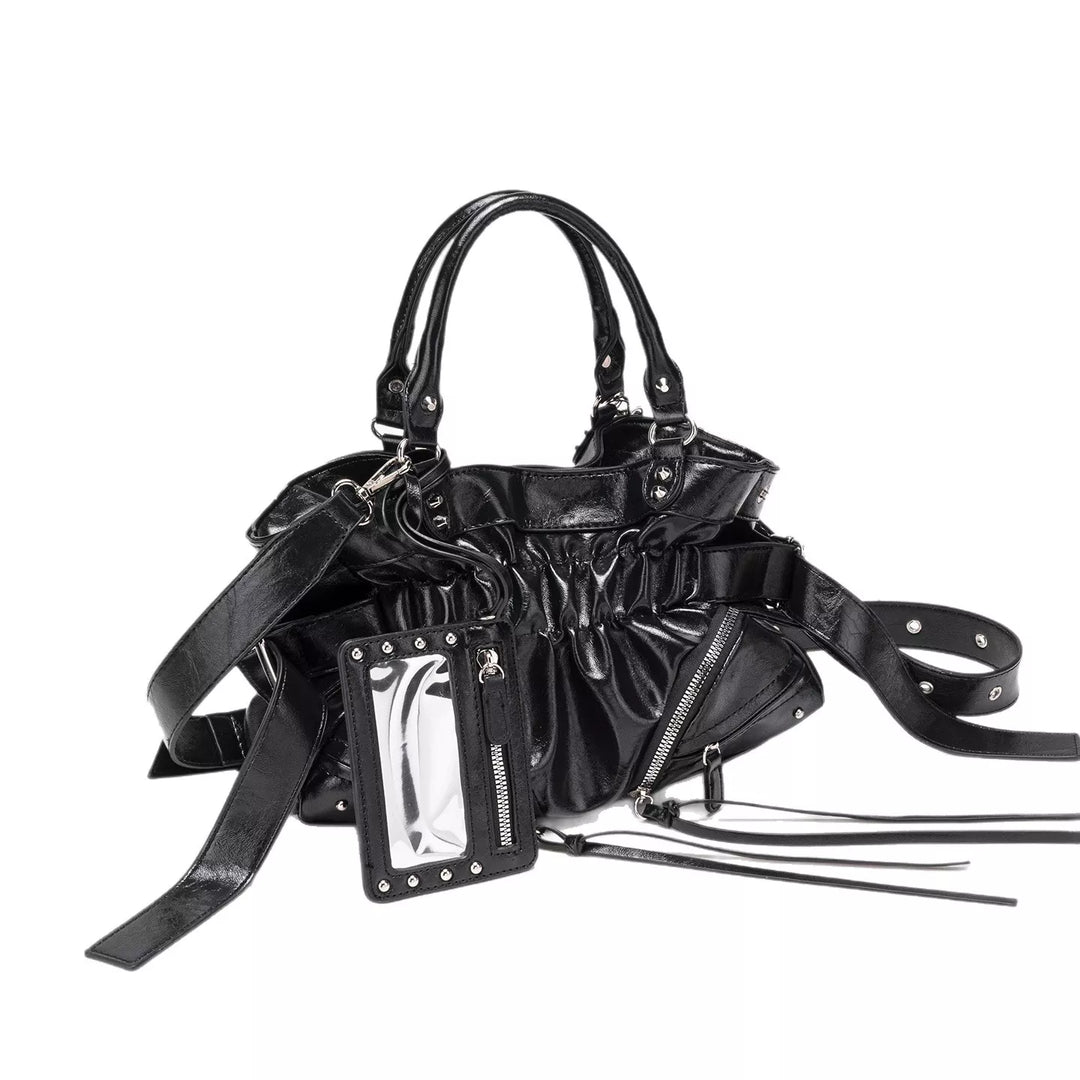 Ruched faux leather crossbody bag with studded mirror charm