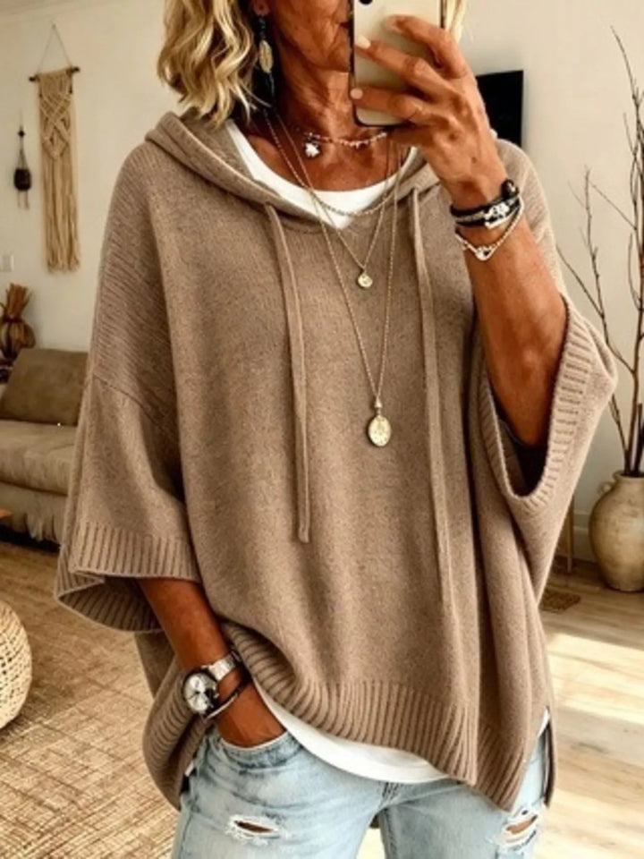 Hooded batwing sleeve knit sweater with drawstring