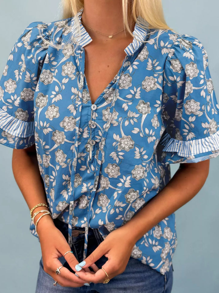 Floral print blouse with ruffle sleeves and split neck tie