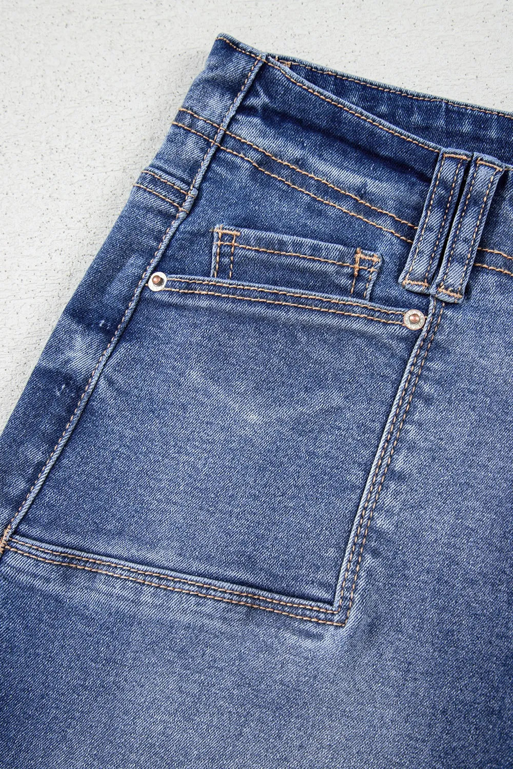 Vintage wash high-rise wide-leg jeans with patch pockets
