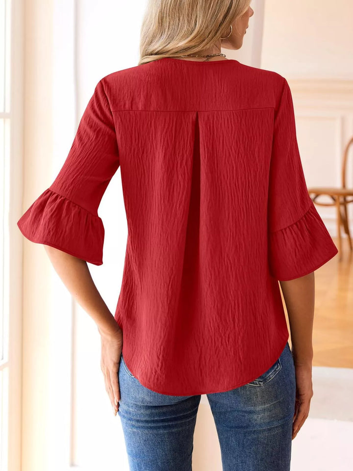 Ruffle trim V-neck blouse with flared bell sleeves