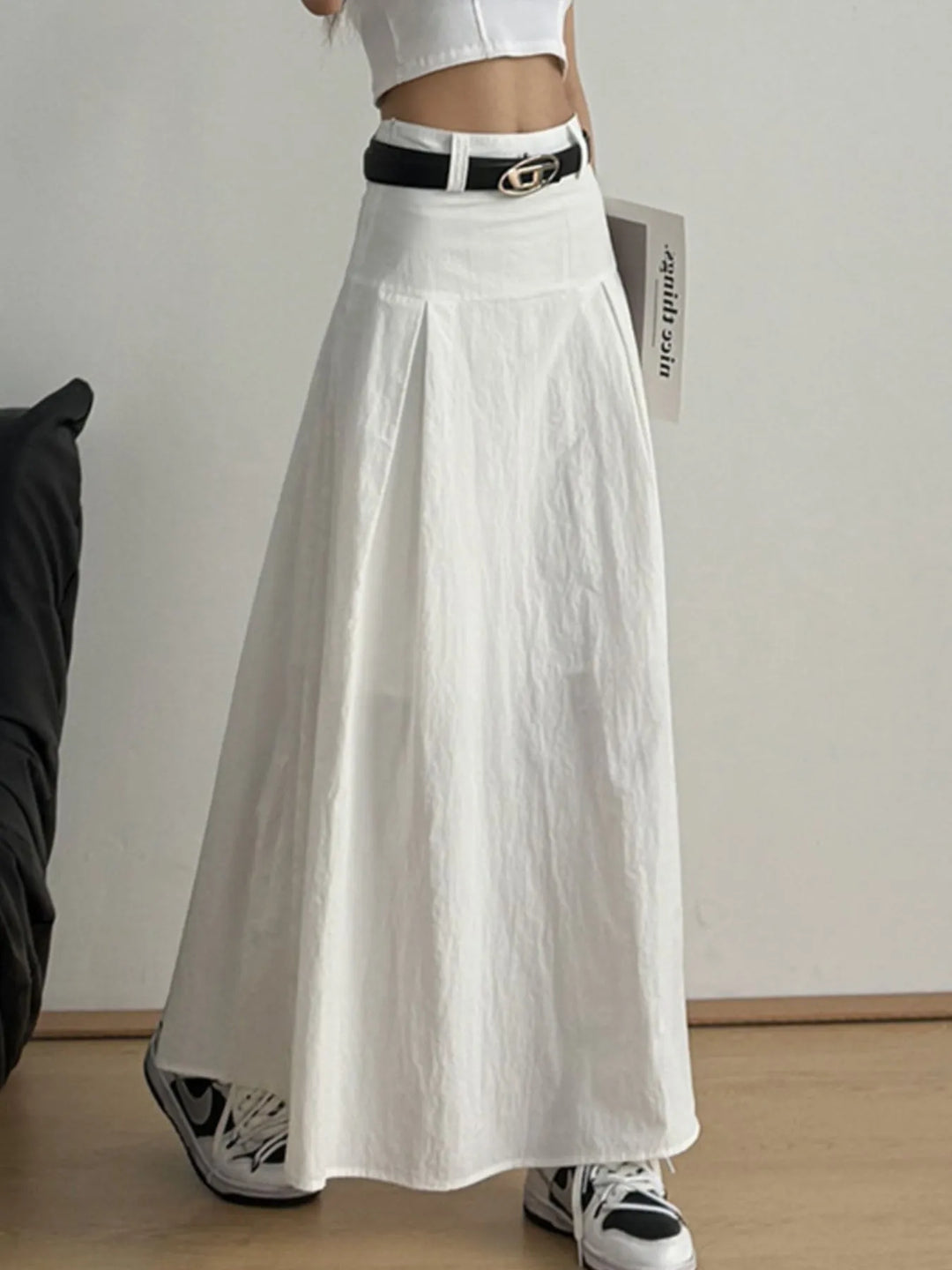 High-rise A-line maxi skirt with front pleats