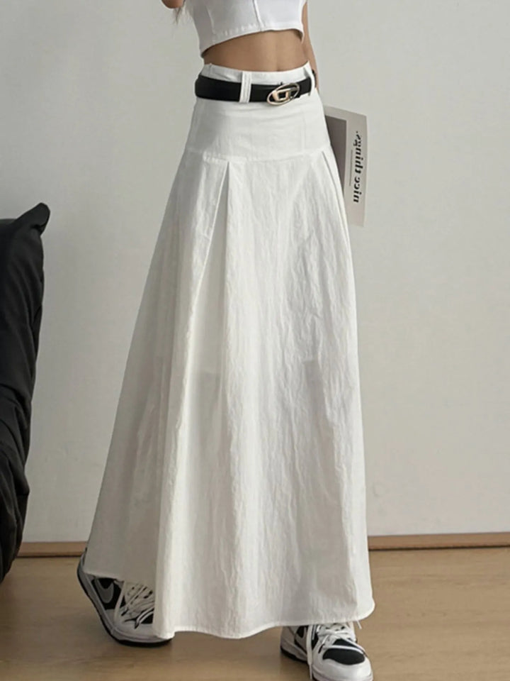 High-rise A-line maxi skirt with front pleats