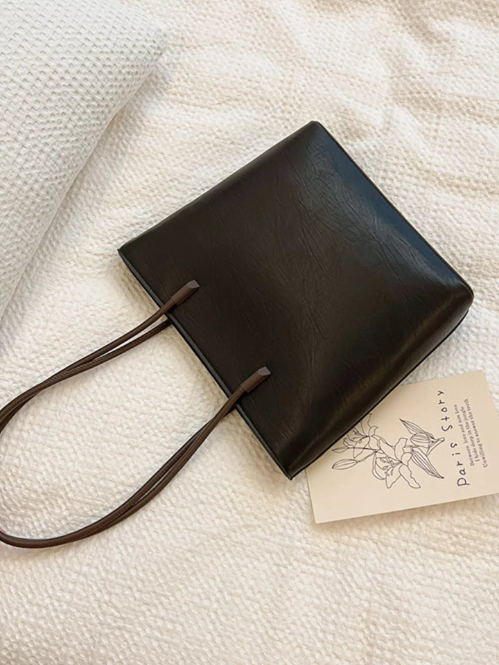 Faux leather shoulder tote bag with slim contrast straps