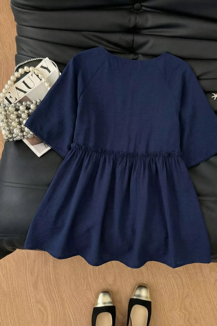 Ruffle hem V-neck blouse with embroidered yoke and lace-trim sleeves