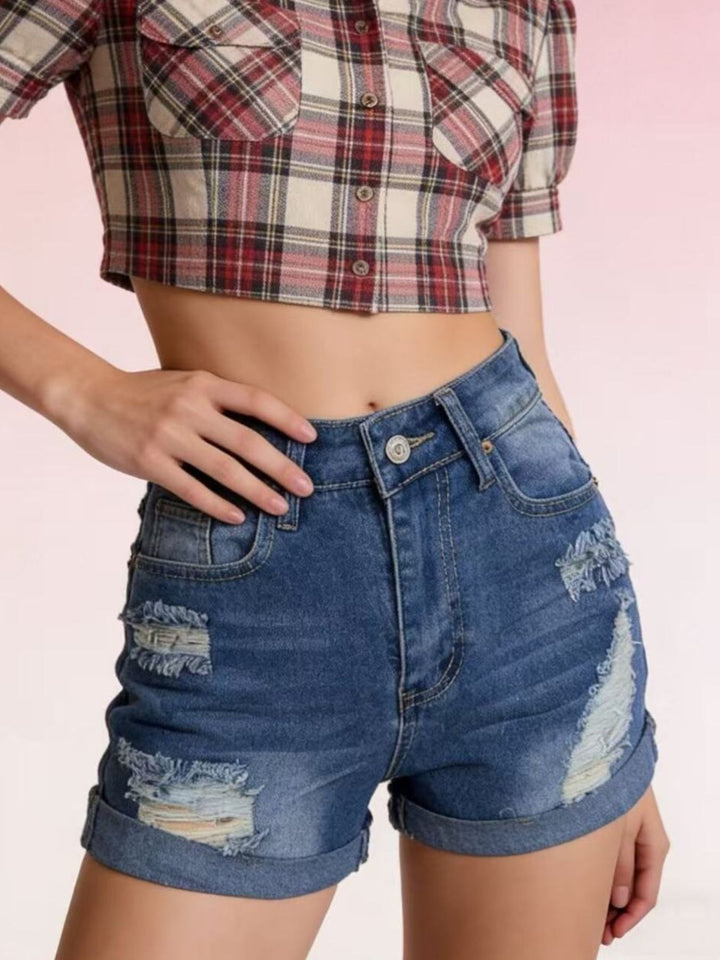 Distressed high-rise denim shorts with cuffed hem
